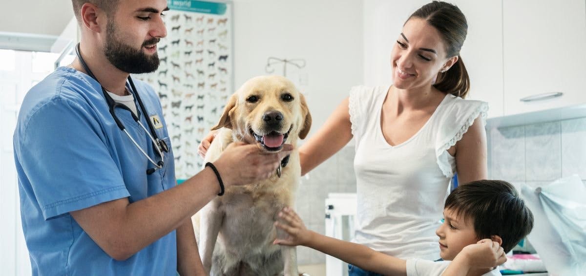 vet tech with family and dog